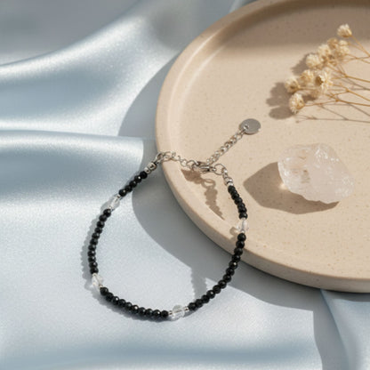 Pulsera de espinela negra, cristal de cuarzo y acero inoxidable plateado